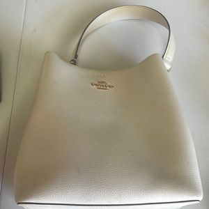 Coach bucket bag with convertible straps